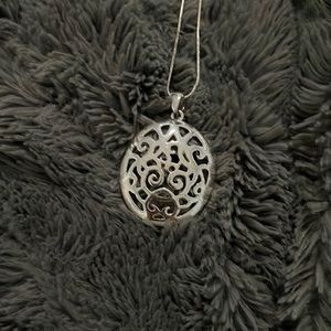 This is a silver necklace in good condition